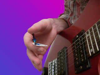 positioning the guitar pick - image 1